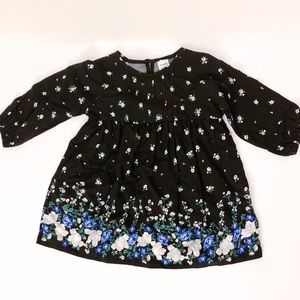 Infant girl black dress with blue floral print.